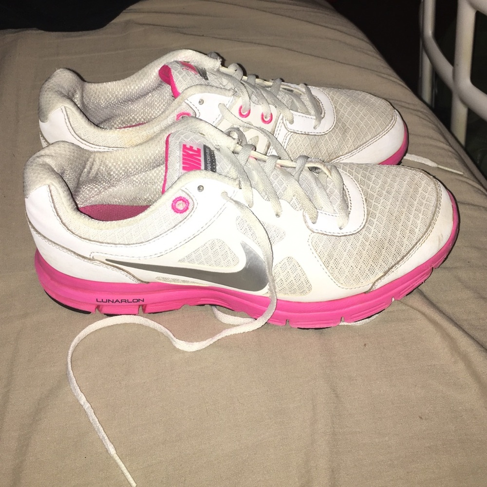 Pink and White Nike Running Shoes